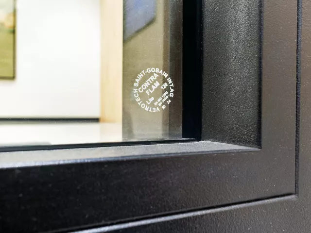 Fire-resistant CONTRAFLAM Vetrotech glass in a black metal frame at a Brookfield property