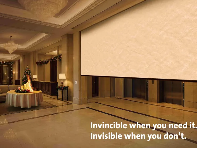 Automatic fire curtain for fire compartmentation in hotel lobies