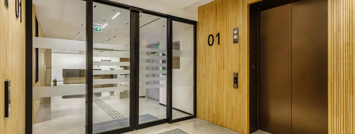 Office interior at Brookfield Properties featuring Vetrotech fire-resistant glass doors