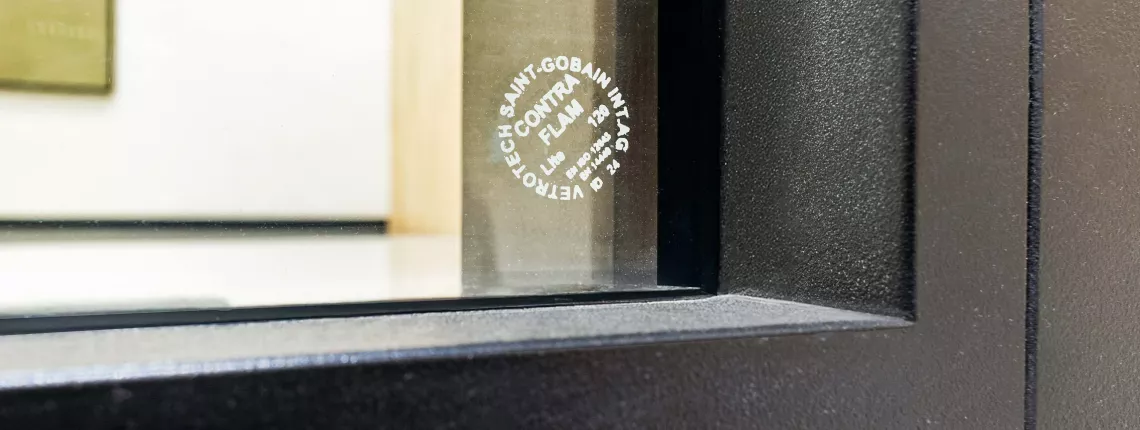 Fire-resistant CONTRAFLAM Vetrotech glass in a black metal frame at a Brookfield property