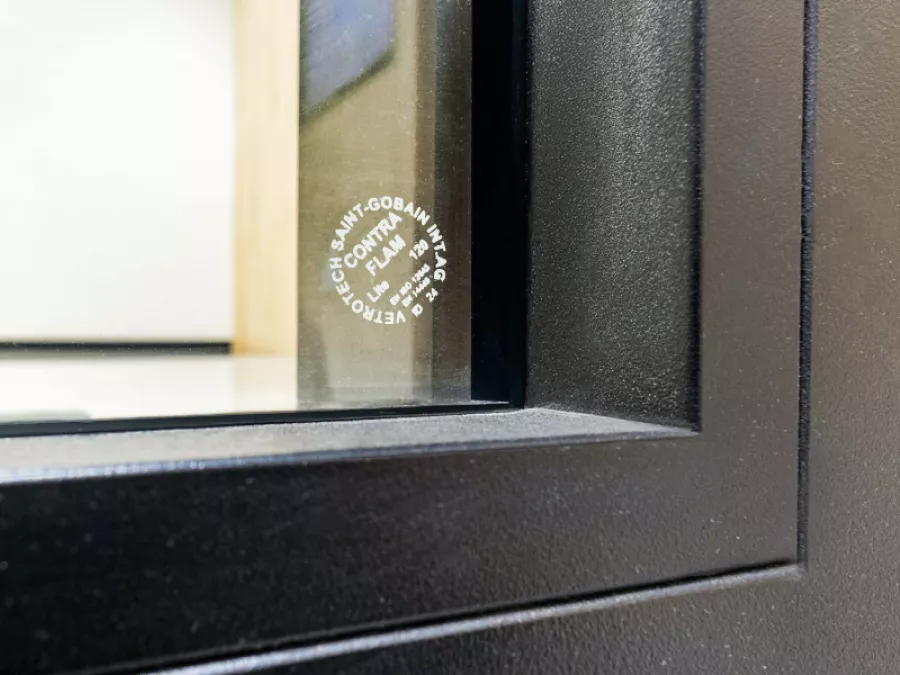 Fire-resistant CONTRAFLAM Vetrotech glass in a black metal frame at a Brookfield property