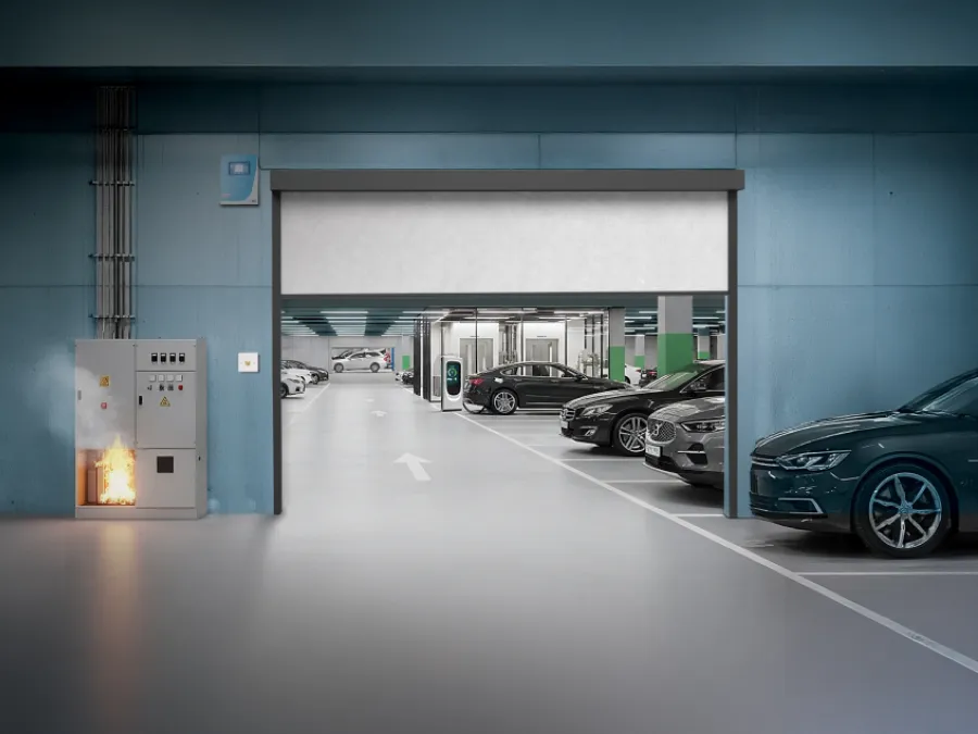 Automatic fire curtain for fire compartmentation in basement car parks